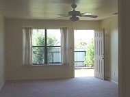 Living room opens onto private patio.