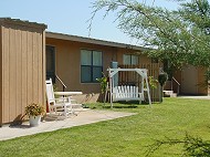 Each apartment has it's own patio. (Swing not provided!)